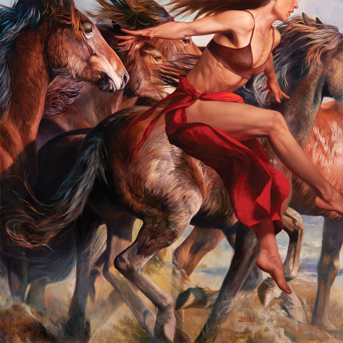Several running horses with a woman in red riding one.